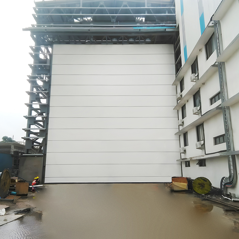 Wind resistant industrial shipyard door for coastal areas