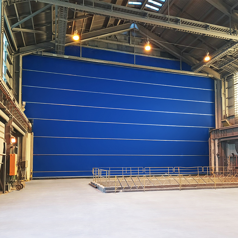 Heavy duty crane bay door for industrial and shipyard use